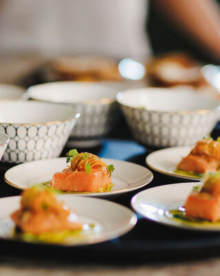 close up set of plates with starters