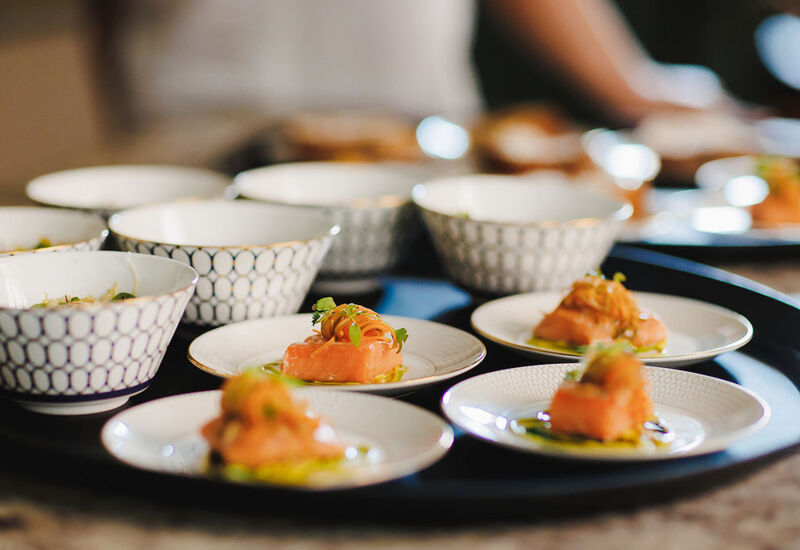close up set of plates with starters