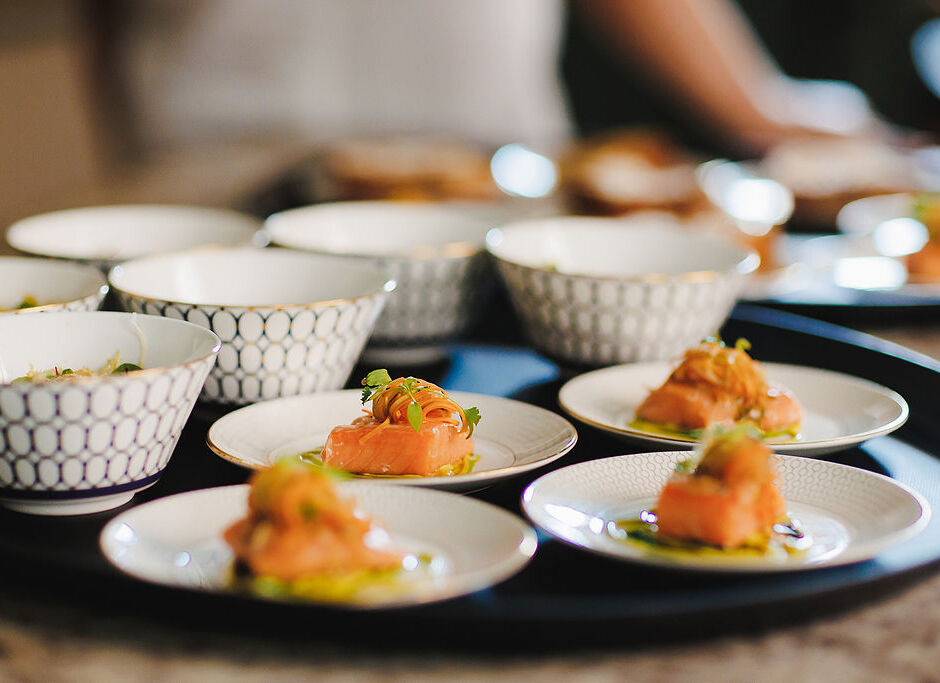 close up set of plates with starters
