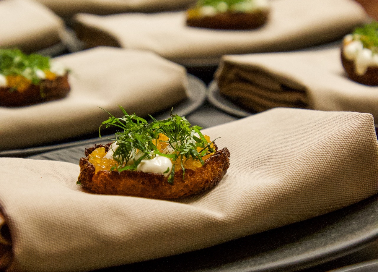 Eggs Benedict served on an elegant cloth at Aihki restaurant.