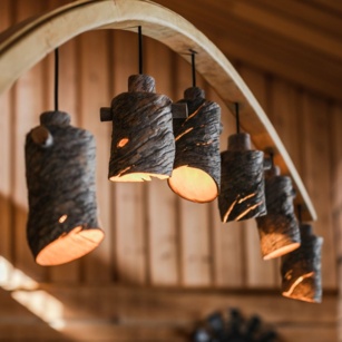 Trunk-shaped lamps in the Sunday Morning Resort.