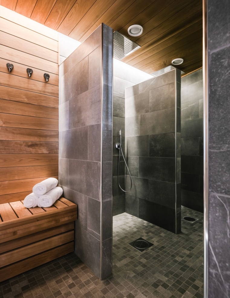 Marble showers in a wooden sauna.