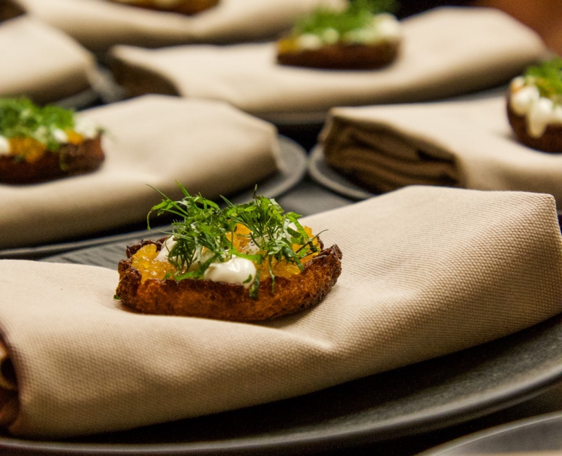Eggs Benedict served on an elegant cloth at Aihki restaurant.