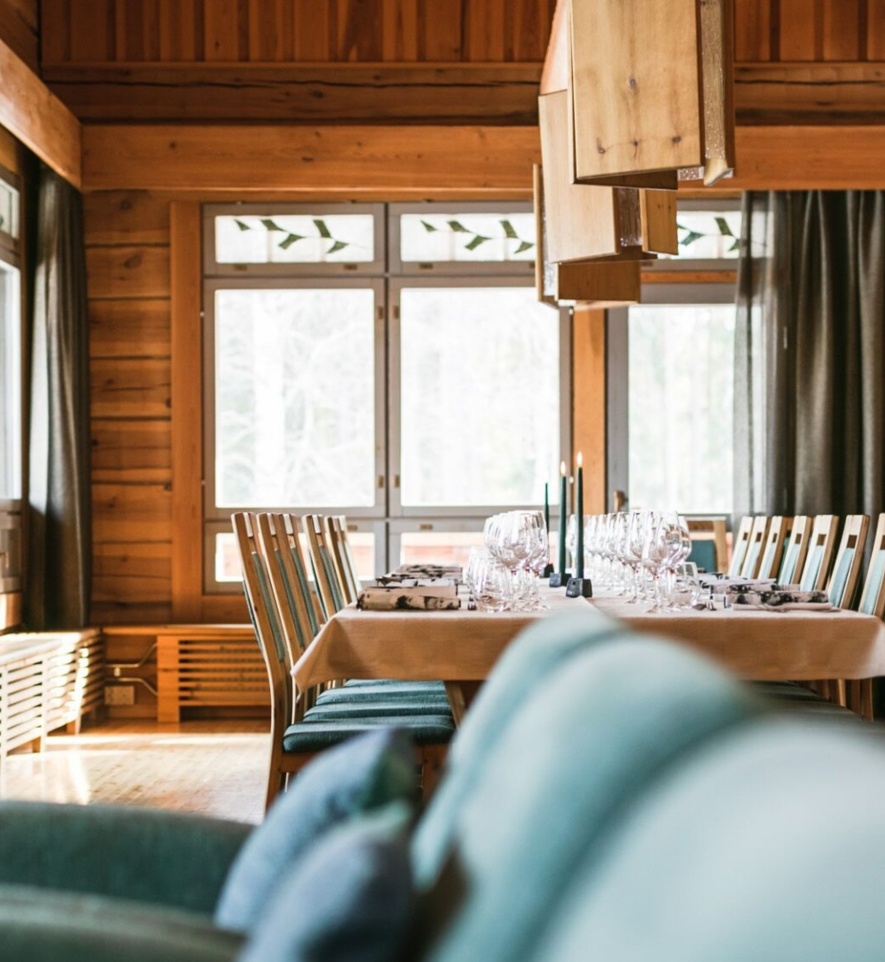 An elegant dining room in a timber lodge.