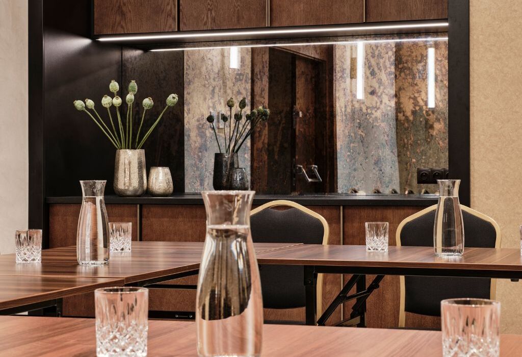 Detail of conference table décor – elegant accessories and modern equipment ensuring comfort during