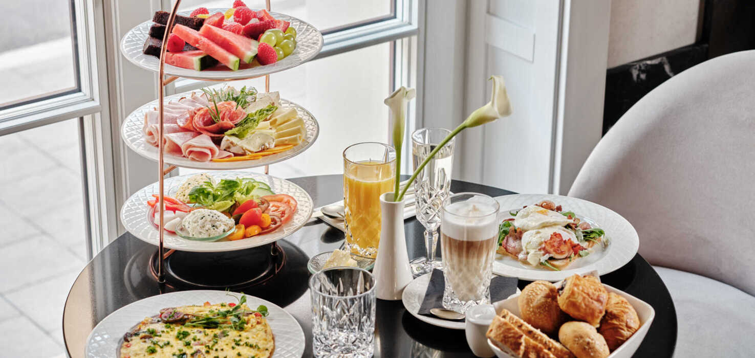 Italian-style breakfast stand, coffee and fresh bread – breakfast in the centre of Krakow