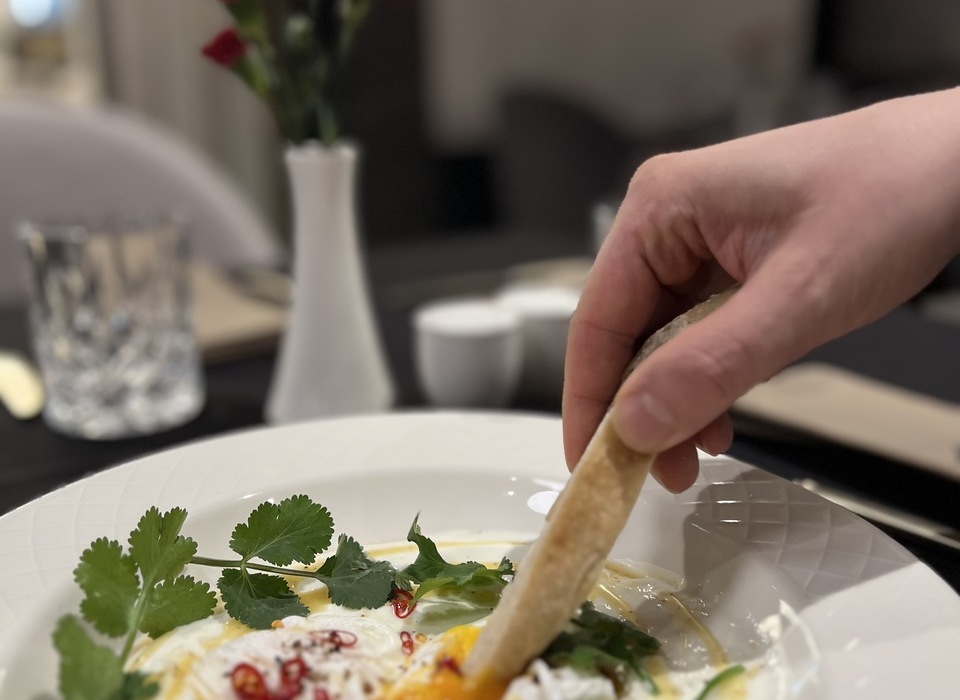 Poached eggs – à la carte breakfast dish in an Italian restaurant in Krakow