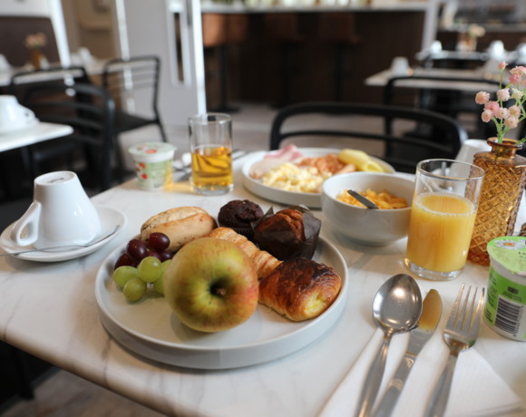 Breakfast buffet table in The Reem Hotel in Bayswater, London