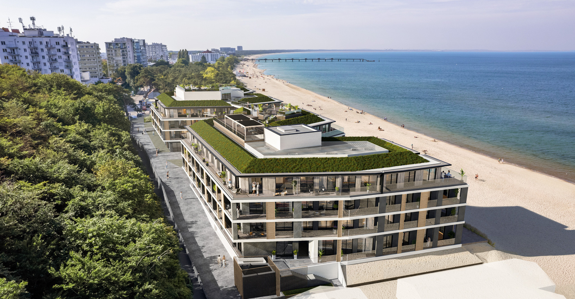 Nowoczesny hotel przy brzegu z zielonymi dachami, tarasami i prywatnymi balkonami, promenadą, piaszczystą plażą i molo