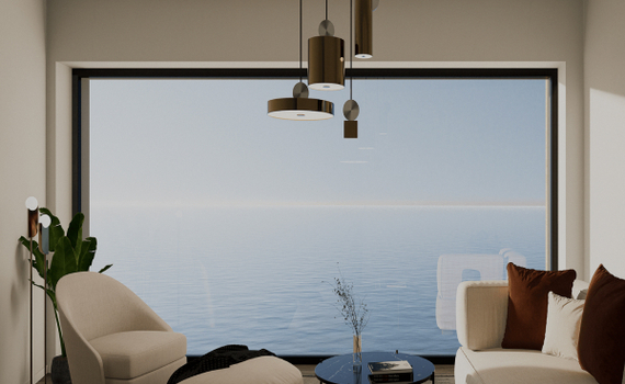 Lounge mit bodentiefer Fensterfront zum ruhigen Meer, modernes Sofa und Sessel, Hängeleuchten und Couchtisch.