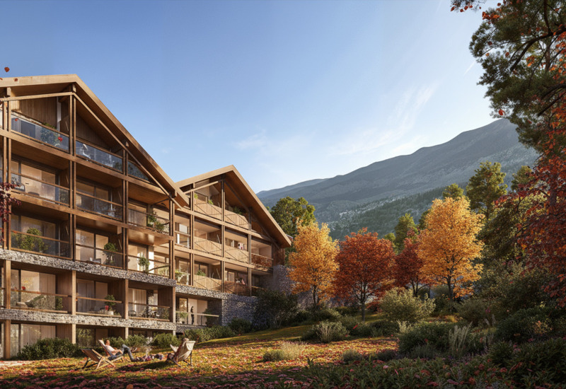 Widok na hotel, w tle góry, w czasie jesieni