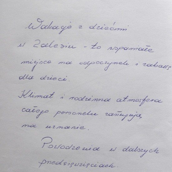 Ręcznie napisany wpis w języku polskim — pozytywna opinia o rodzinnym pobycie z dziećmi i przyjaznym personelu.
