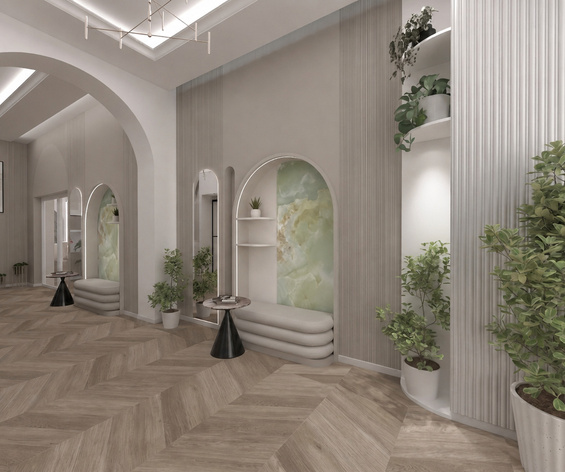 Eleganckie lobby hotelowe z łukowymi wnękami i siedziskami, zielonym onyksem, roślinami, subtelnym oświetleniem i drewnianą podłogą.